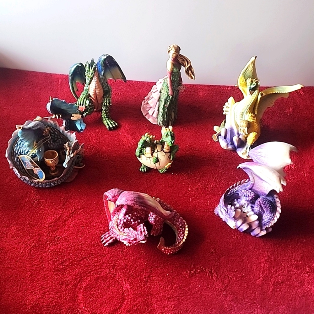 Set of 7 Dragon Figurines.